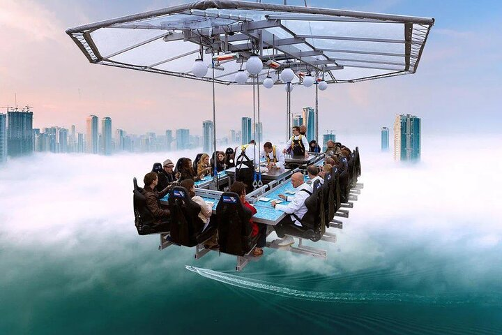 Elevate your dining experience while enjoying stunning views from high above the clouds. Delight in exquisite flavors as you share unforgettable moments in a unique setting.